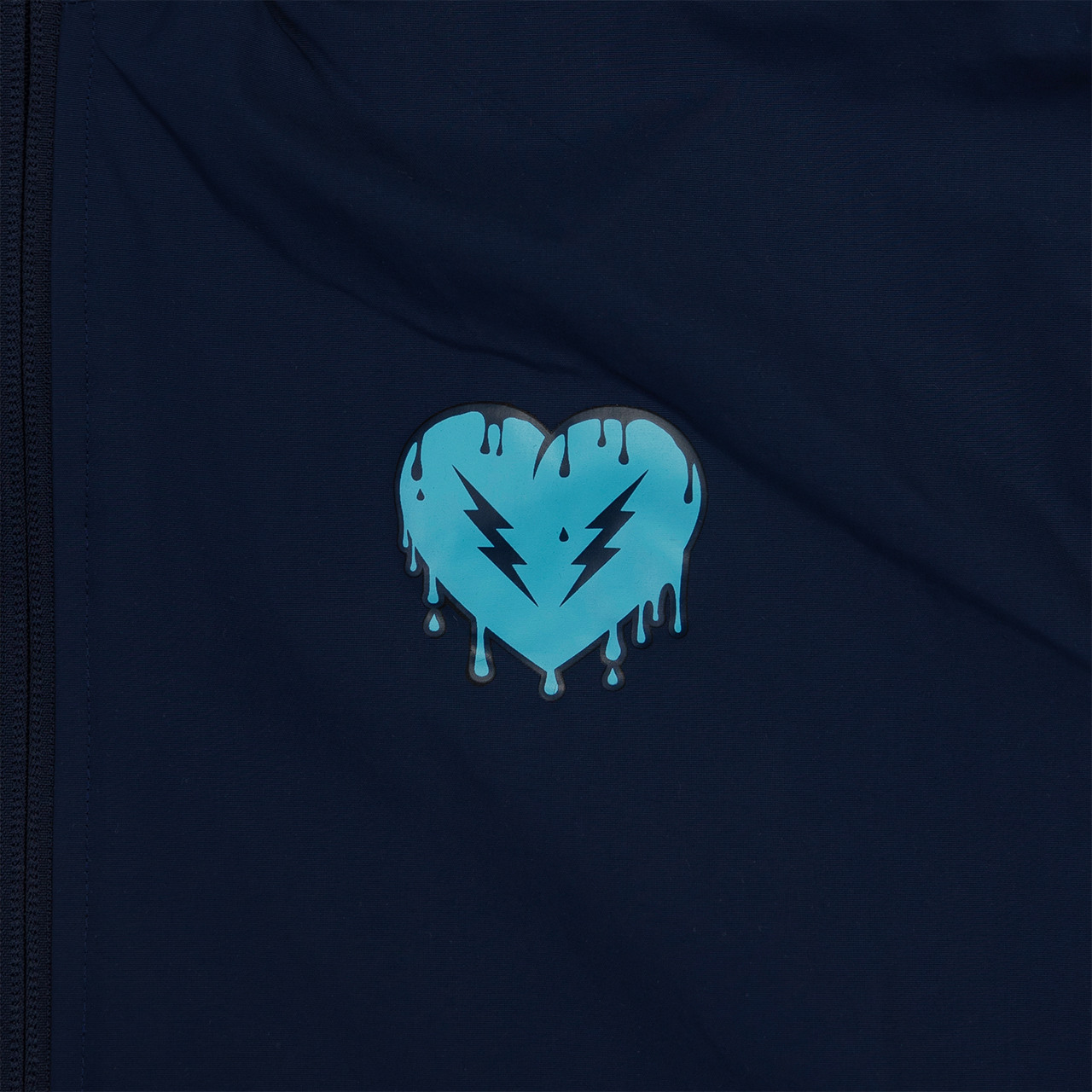 Blue heart-shaped logo with lightning bolts and dripping effect.