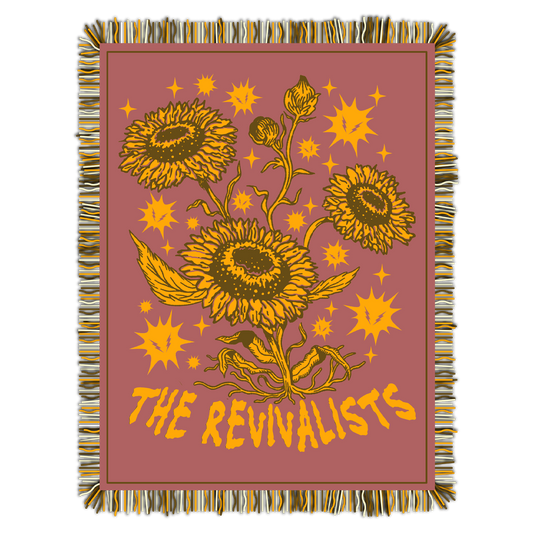 Blanket with sunflower design and 'The Revivalists' text on a pink background