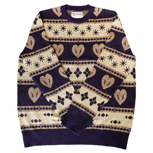 Patterned knit sweater with hearts and geometric designs in navy blue and beige.