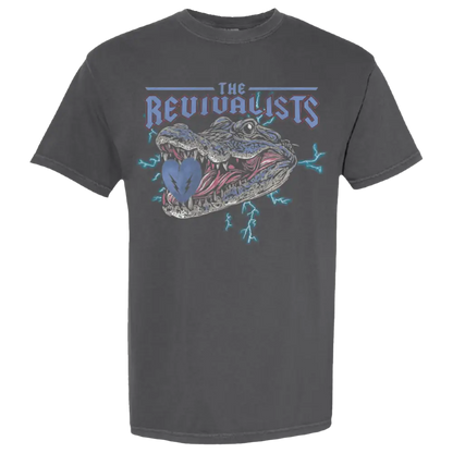 Dark gray t-shirt featuring a graphic design of an alligator’s open mouth with ’The Revivalists’ text above it.
