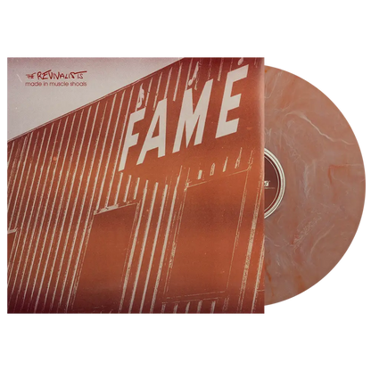 Vinyl record album with ’FAME’ prominently displayed on the cover.