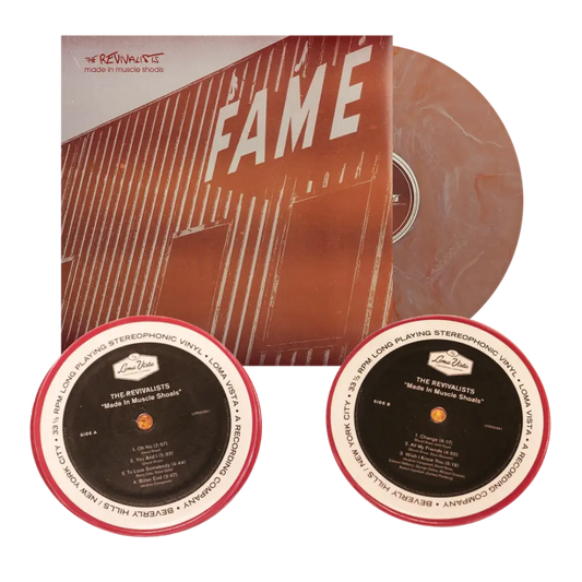 Vinyl record album titled ’Fame’ with accompanying record labels.