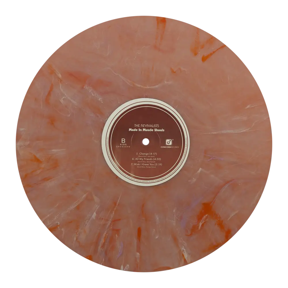 Marbled orange and white vinyl record with a brown label in the center.