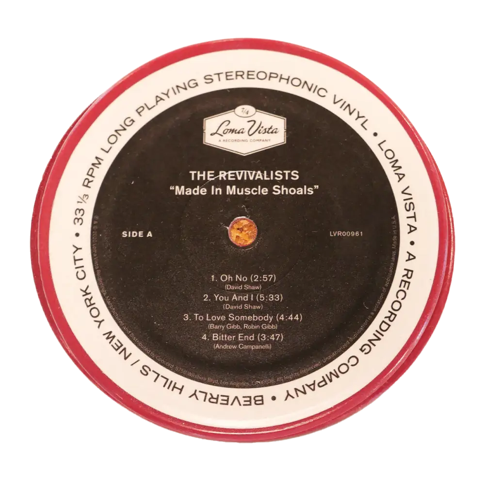 Vinyl record label for ’The Revivalists’ album titled ’Made in Muscle Shoals’ on Side A.