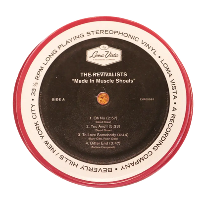 Vinyl record label for ’The Revivalists’ album titled ’Made in Muscle Shoals’ on Side A.