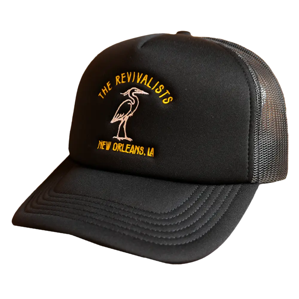 Black pelican hat trucker with gold heron embroidery mesh back and the revivalists new orleans text