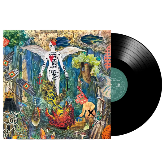 Vinyl record album with a colorful, surreal jungle-themed artwork on its cover.