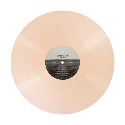Translucent peach vinyl record showing get it honest title and tracklist for driven right fan pack pre order