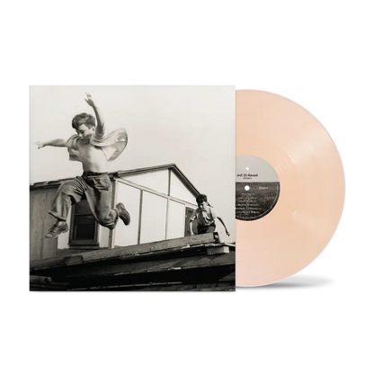 Pale peach vinyl record with black and white rooftop boys album cover in driven right fan pack pre-order