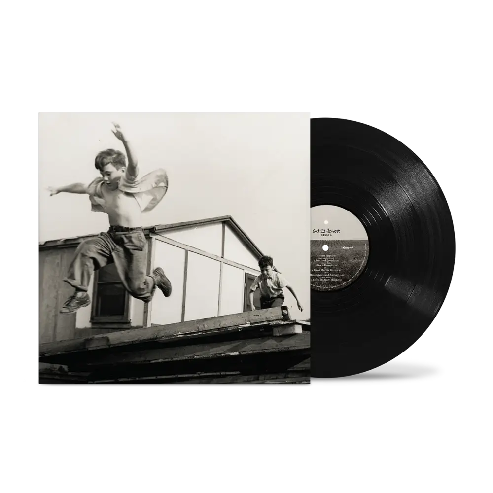 Black vinyl record with white label featuring album get it honest by snoop dogg in true black honest vinyl