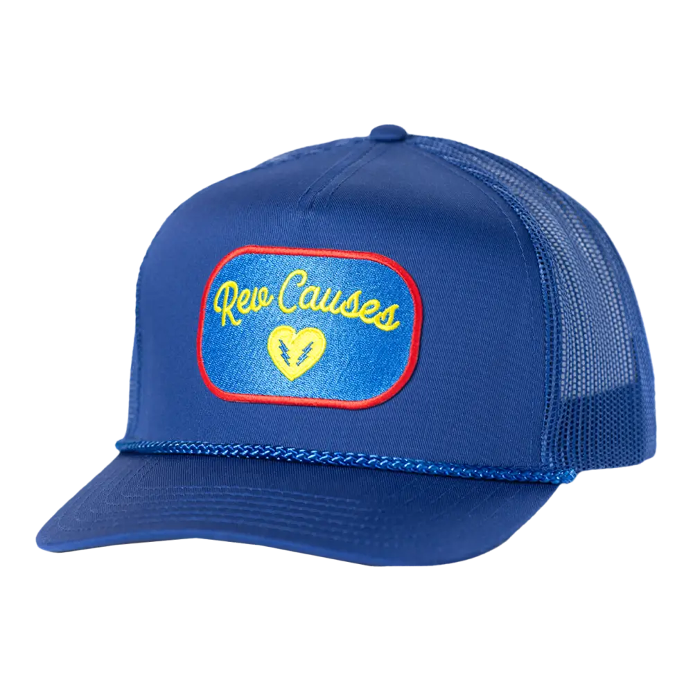 Blue trucker-style baseball cap with a patch featuring ’Rare Causes’ text and a heart logo.